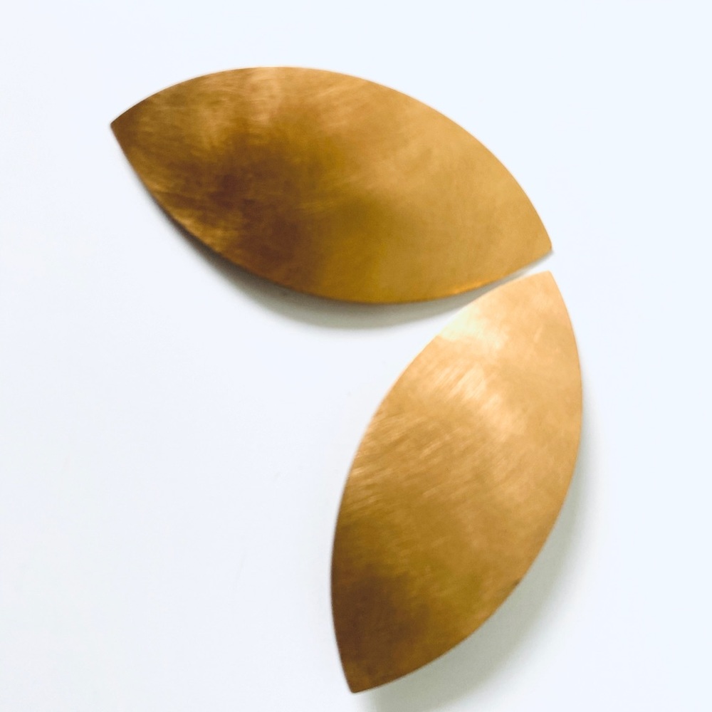 Yellow gold leaf metal statement clip on earrings